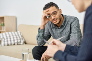 Therapist consulting with a patient